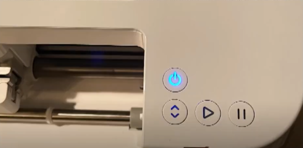 button-on-your-Cricut-machine-will-turn-white-to-blue