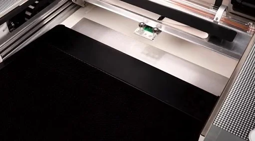 slide the crumb tray onto the Glowforge