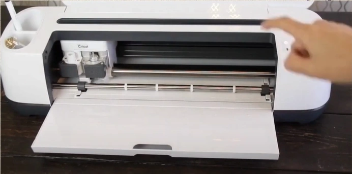 Cricut machine is turned on and is within 10-15 feet