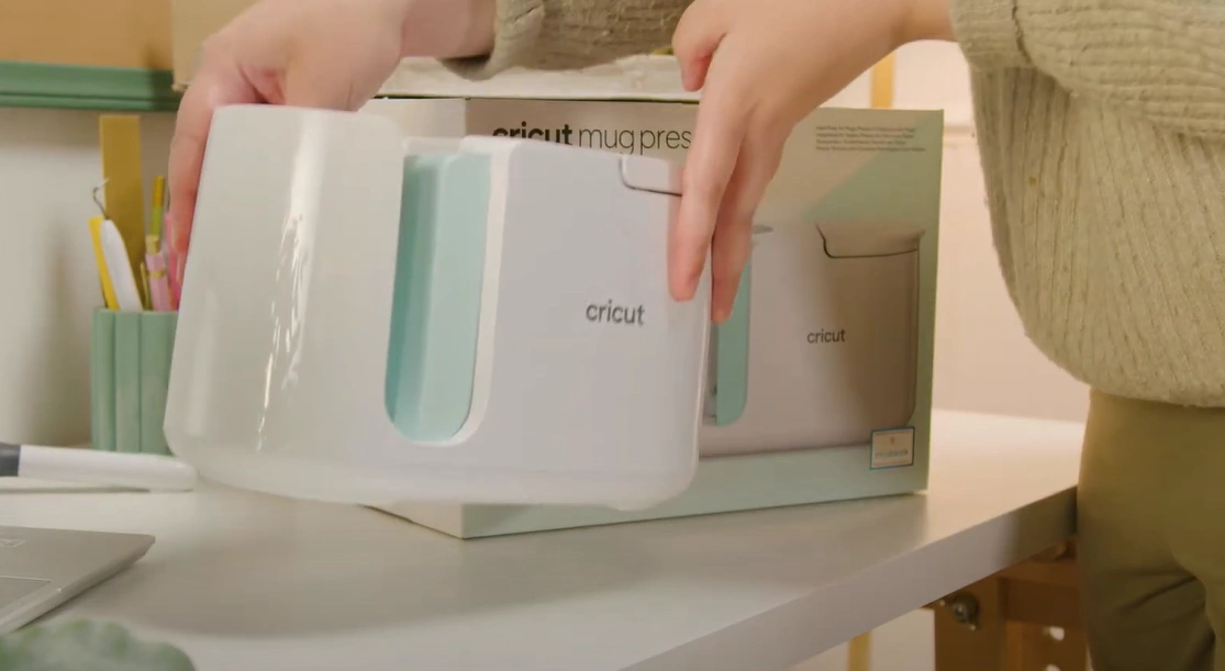 Carefully take out the Mug Press