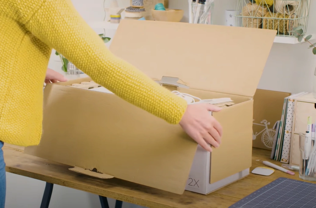 carefully take out the Cricut machine