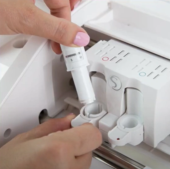 Next, remove the blade from its housing and reinsert it