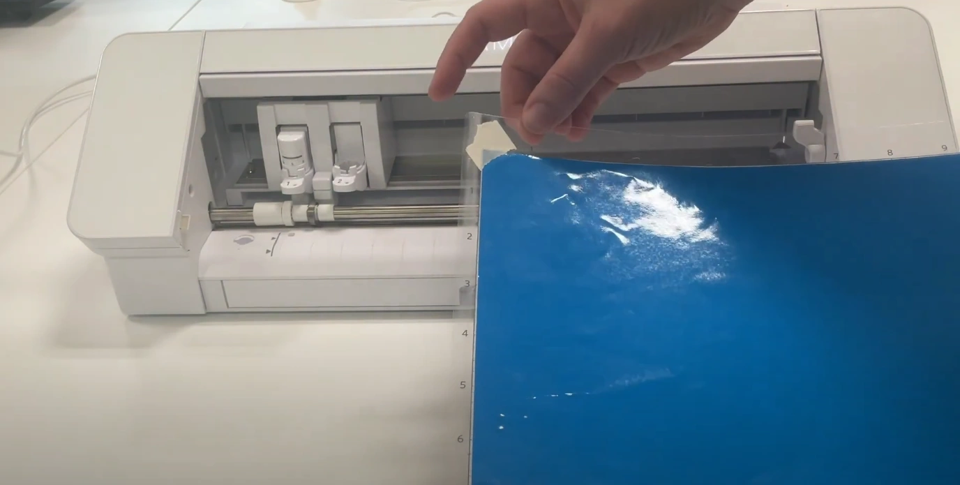 Line the left edge of the mat up according