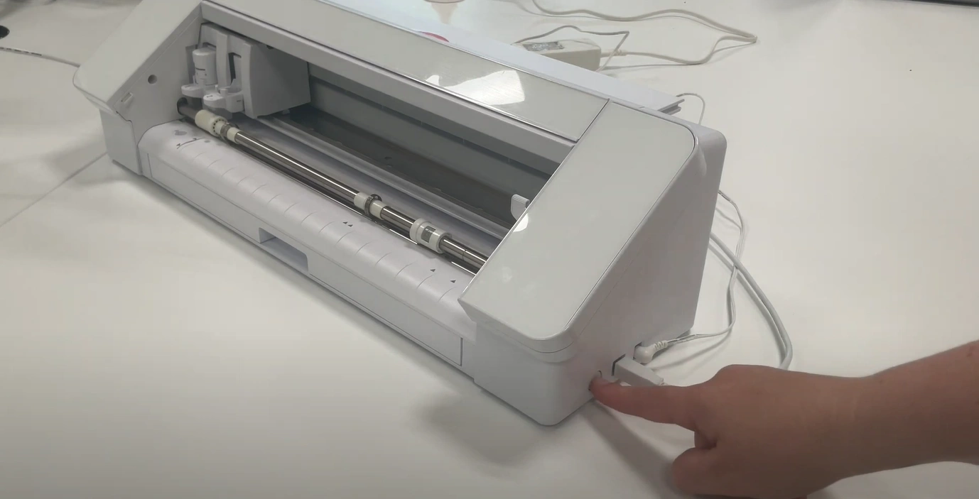 Power on the cutting machine