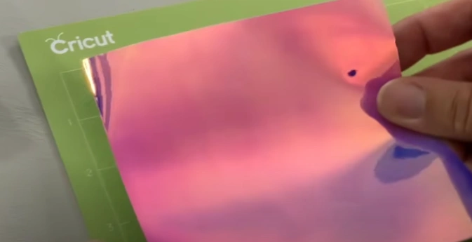 Cut a piece of vinyl slightly large