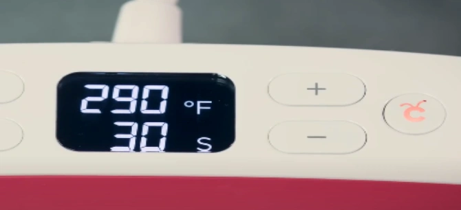 The Cricut button stays orange until it reaches the temperature you set