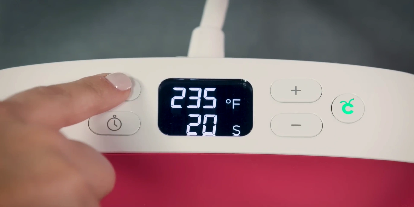 Press the thermometer button