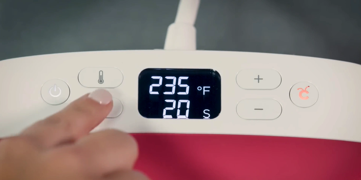 Press the timer button