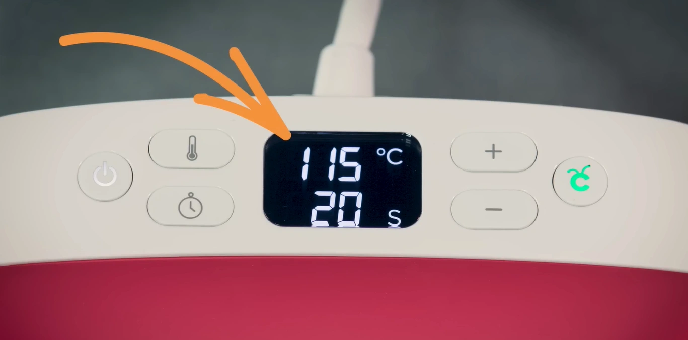 Wait for a minute or two for the machine to reach your preferred temperature.