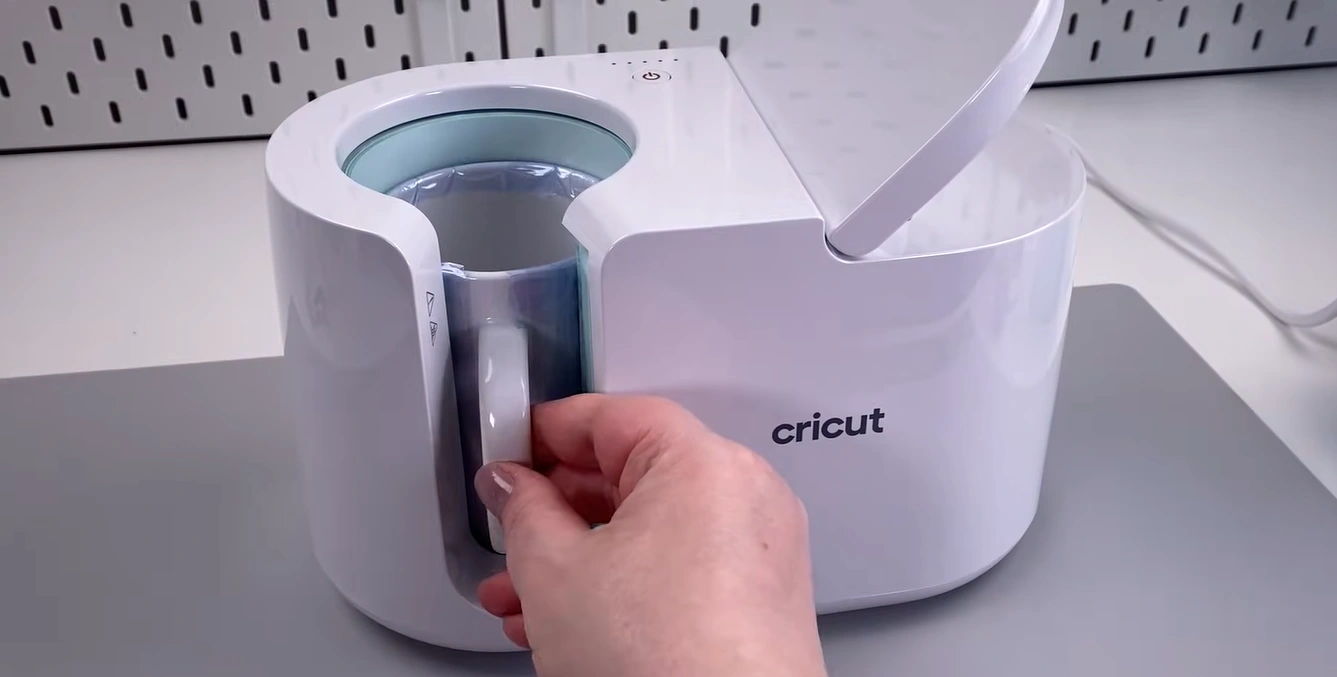 Place the mug into the preheated machine 