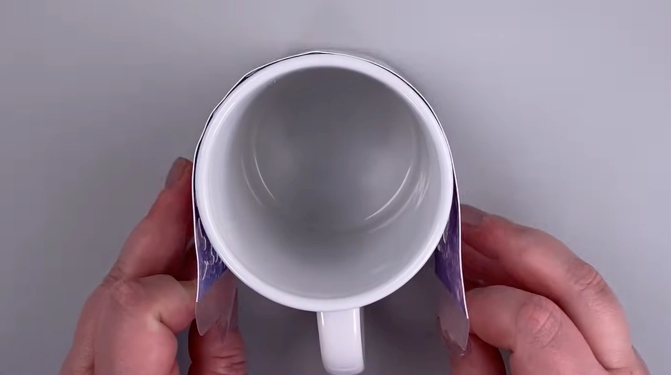 Wrap your design tightly around the mug